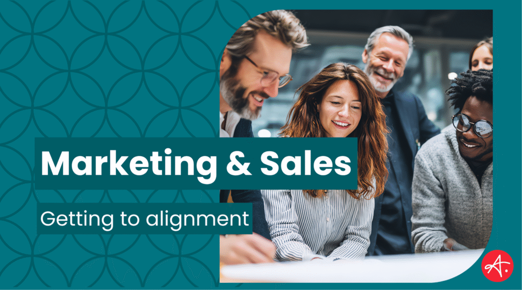 Marketing and sales alignment graphic showing a diverse group of professionals collaborating around a table, paired with text promoting teamwork and unified revenue efforts.