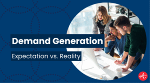 Team of marketing professionals gathered around a computer discussing demand generation strategy with text overlay reading Demand Generation Expectation vs. Reality, representing teamwork and performance alignment in marketing.