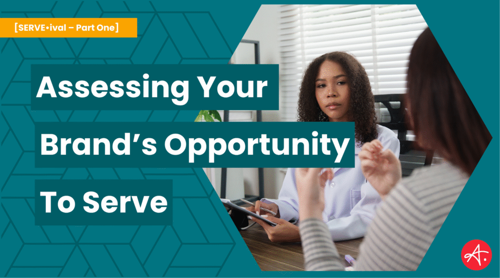 Two professionals engage in a thoughtful conversation across a desk, representing a strategic business discussion. Text overlay reads: Assessing Your Brand’s Opportunity to Serve – [SERVE•ival – Part One].