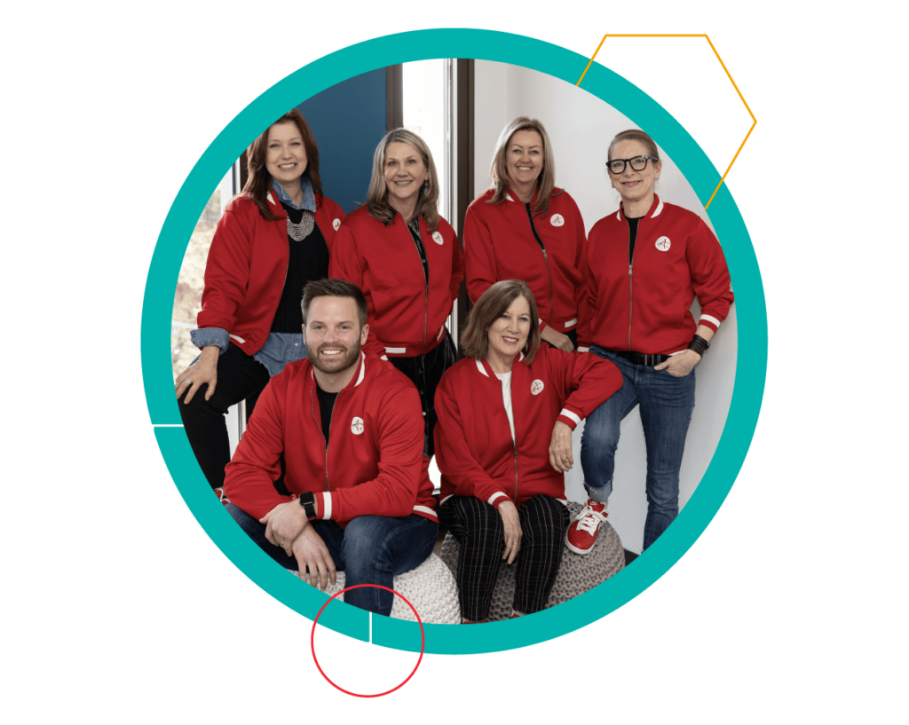 Authentic team members in matching red jackets