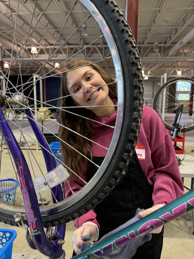 Two or More volunteer working on bikes at FB4K