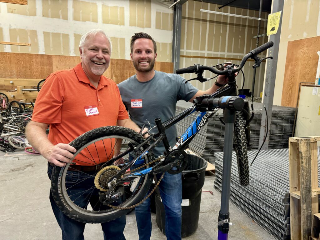 Two or More volunteers working on bikes at FB4K