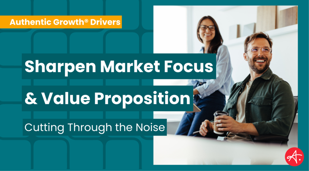 Smiling professionals in a casual office setting, emphasizing the importance of sharpening market focus and refining brand value propositions.