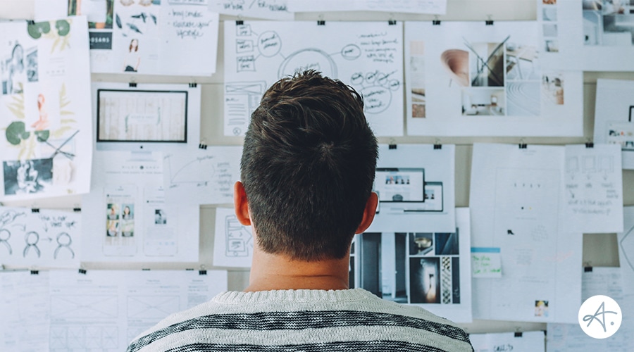 An individual looking at various marketing materials